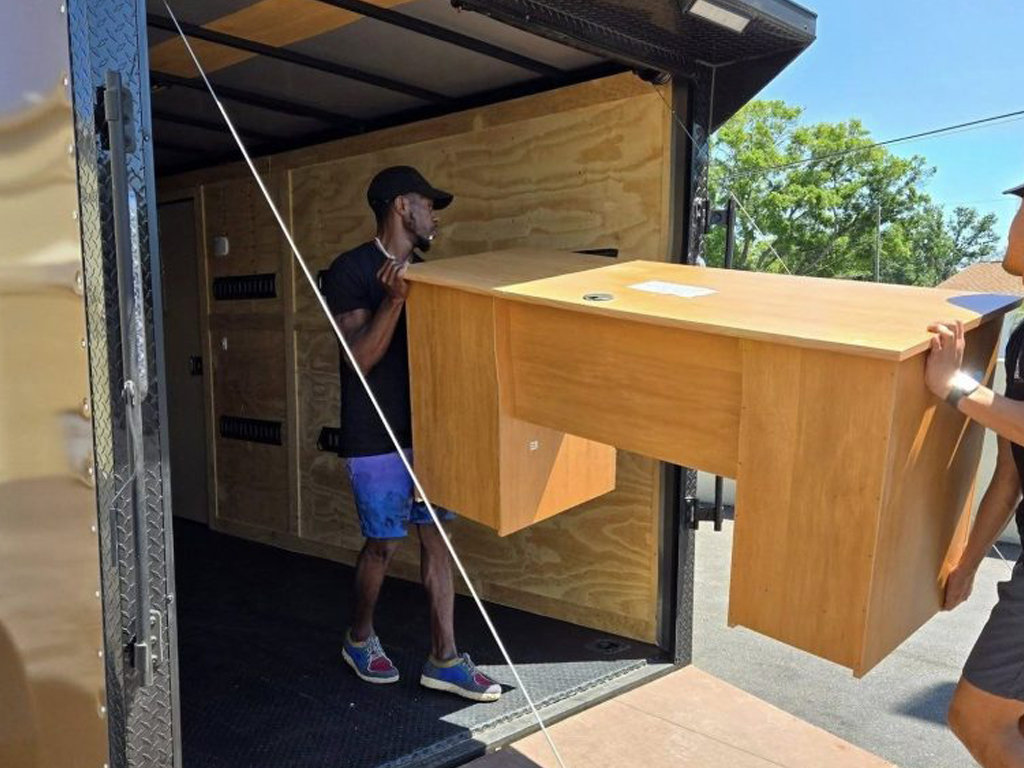 Diligent-Services-team-carefully-delivering-furniture-to-Clearwater-home